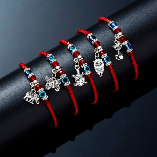 Sacred Charm: Lucky Red Cord Braided Bracelet