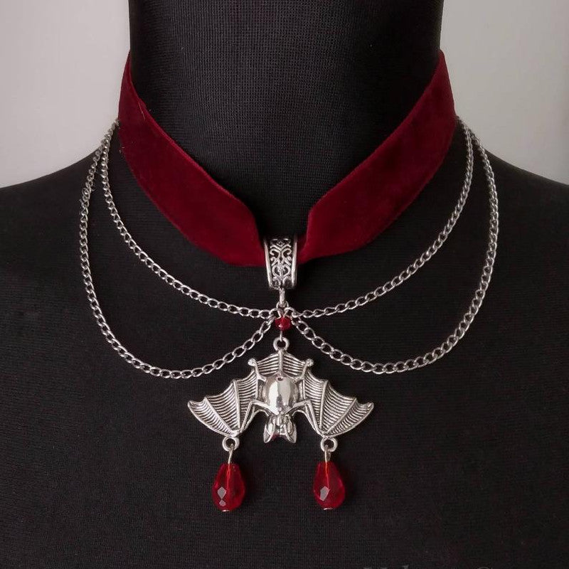 Gothic Enchantment: Crimson Velvet Choker with Midnight Bat Pendant