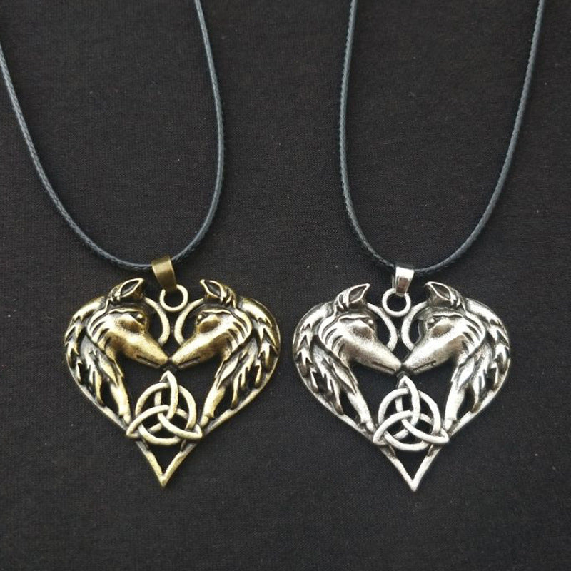 CELTIC TRINITY KNOT HEART SHAPED WOLVES NECKLACE