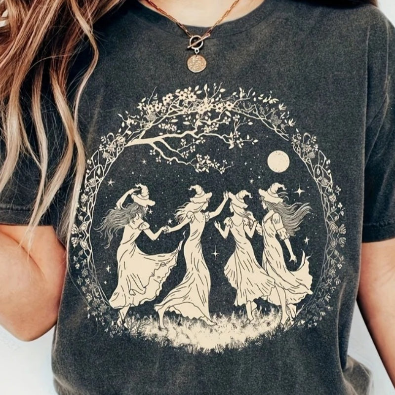 Four witches dancing beneath the moon in a floral circle T-shirt