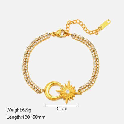 Divine Celestial Glow Bracelet with crescent moon and starburst, gold finish, adjustable chain, enhances intuition and wisdom.