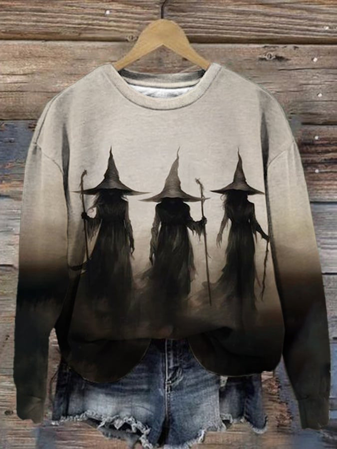 Dark sweatshirt with three mist-shrouded witch silhouettes