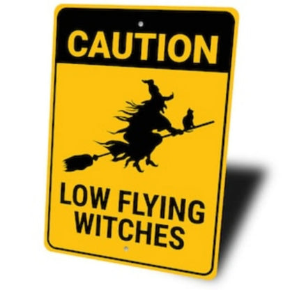 Caution: Low Flying Witches Sign
