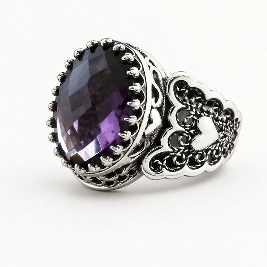 Amethyst Crown Love Ring on a near-white studio background