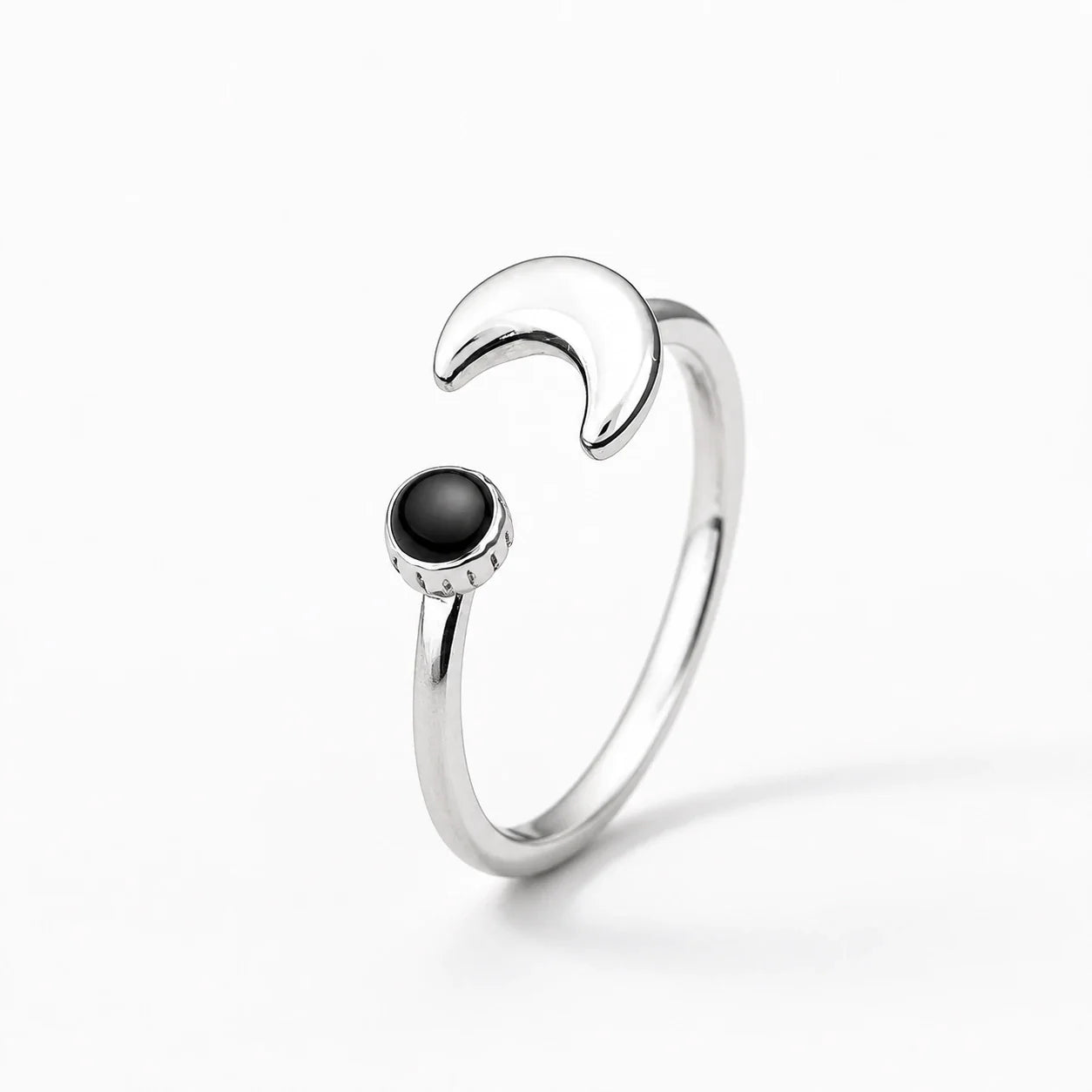 Midnight Crescent Charm Ring on a near-white studio background