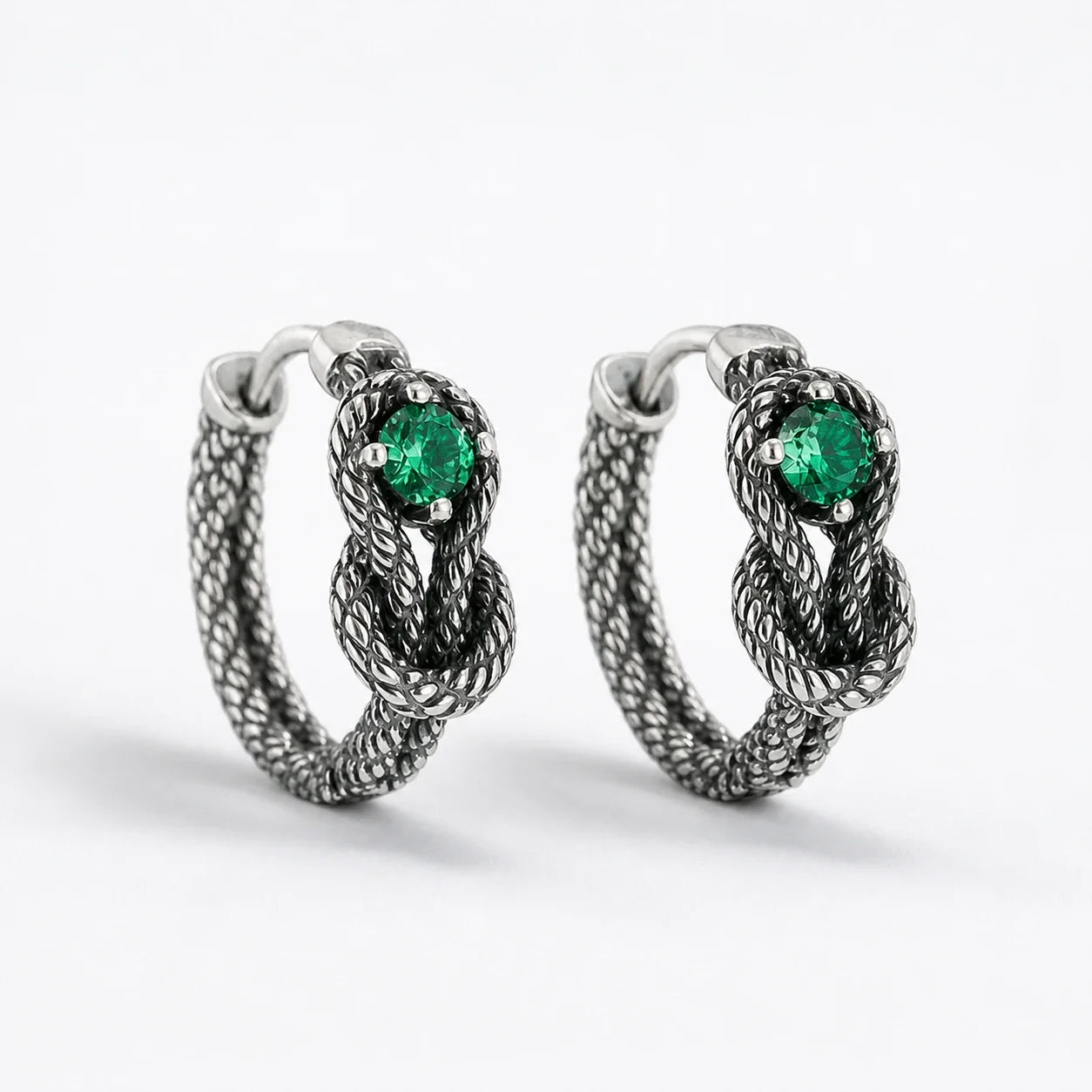Witches Knot Emerald Earrings studio product photo