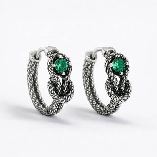Witches Knot Emerald Earrings studio product photo
