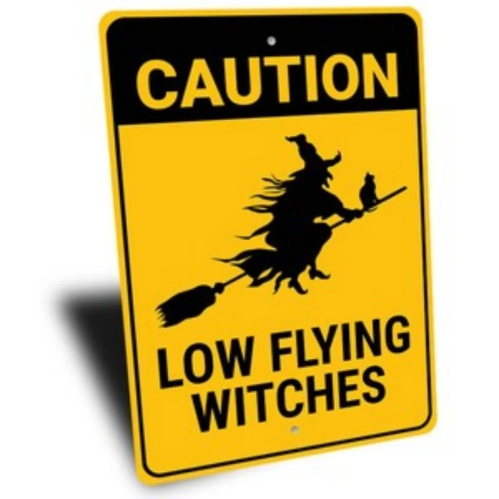 Caution: Low Flying Witches Sign