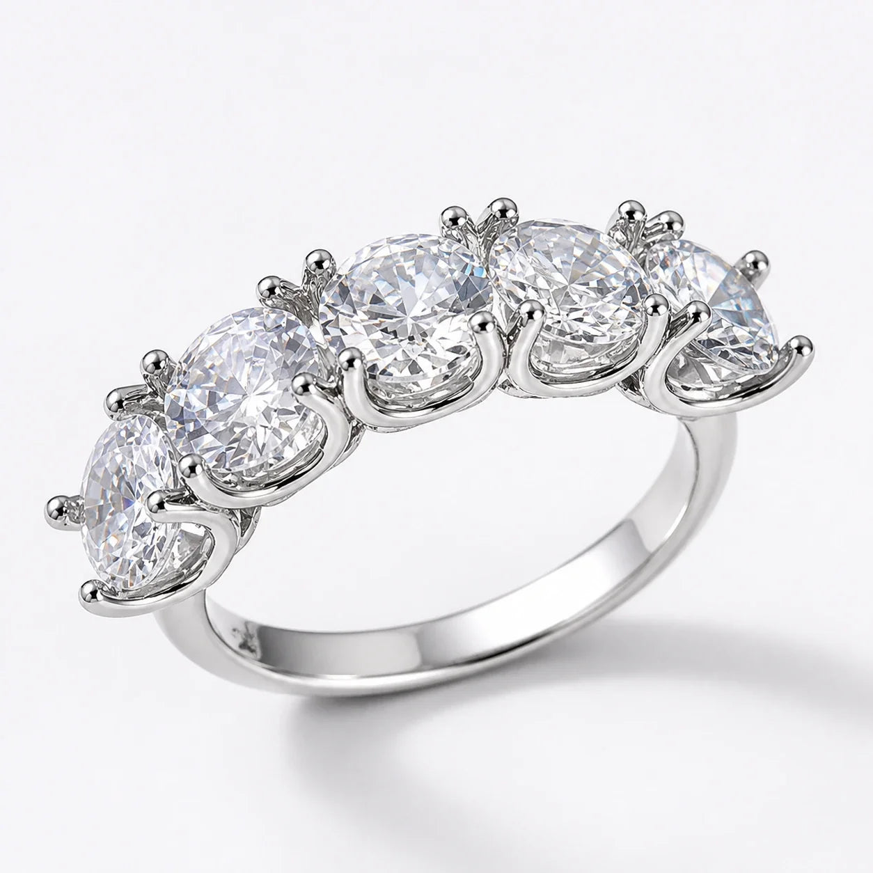 Pentacle Light Crystal Ring with five clear crystals on a near-white studio background