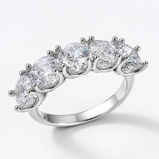 Pentacle Light Crystal Ring with five clear crystals on a near-white studio background