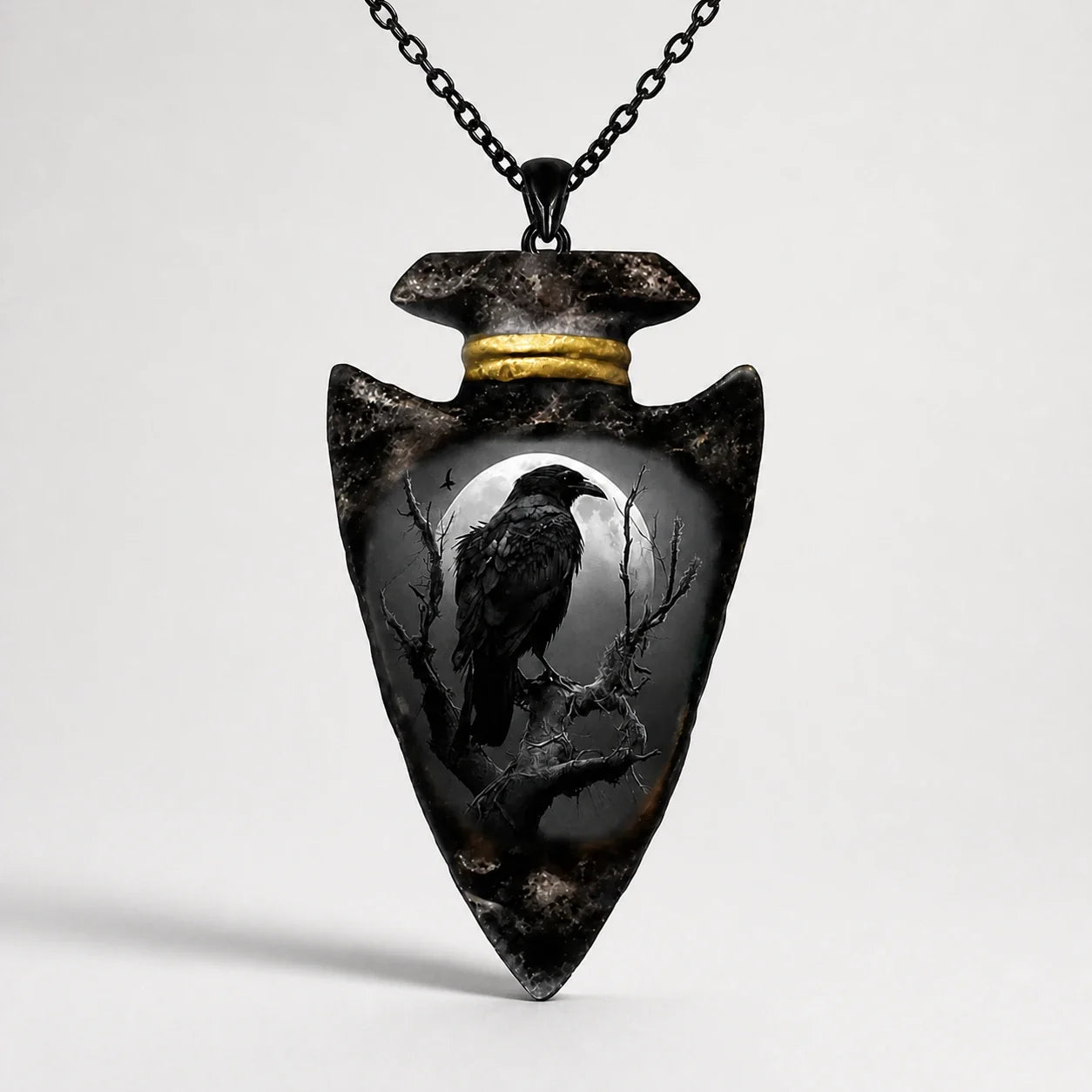 Raven Arrowhead Moon Necklace studio product photo