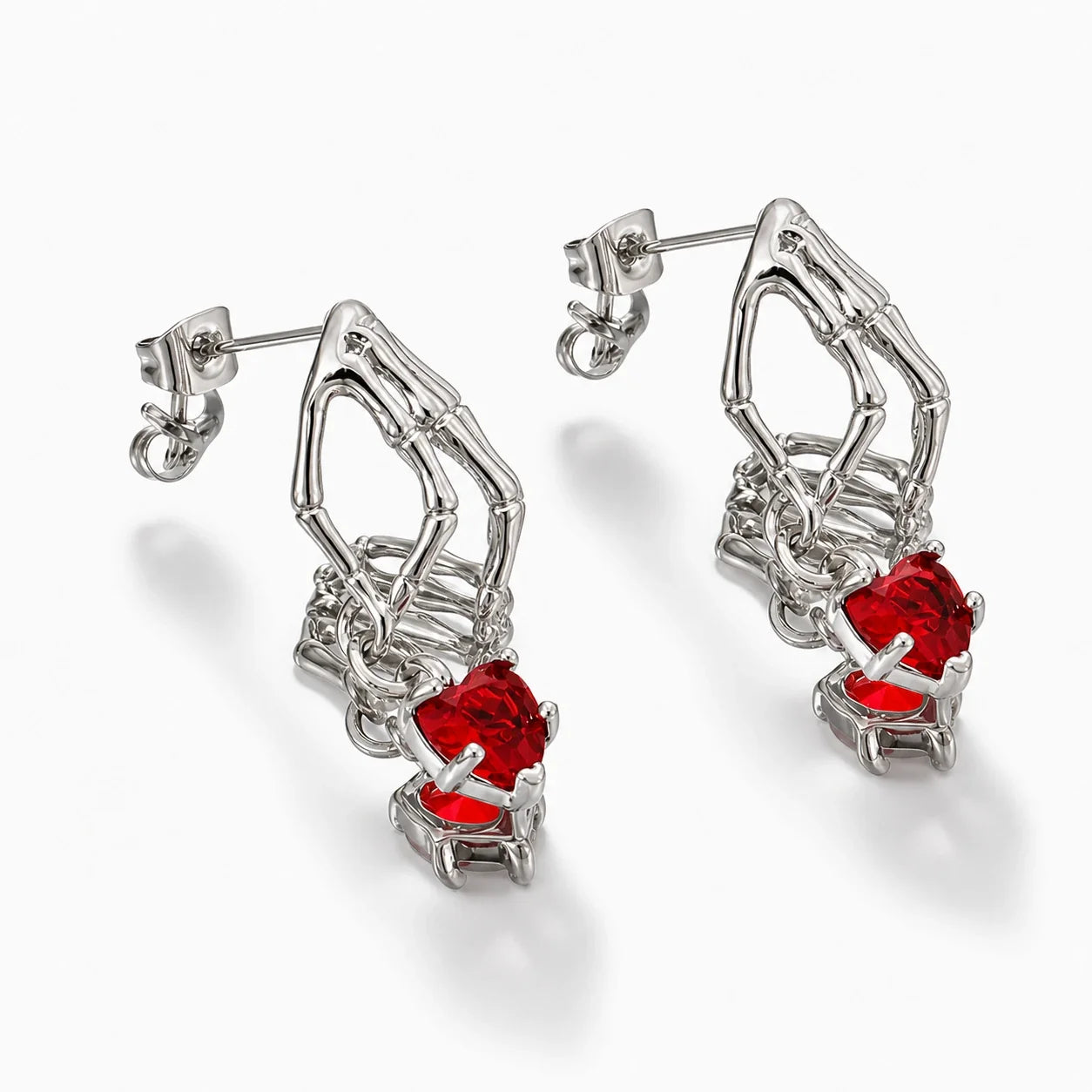 Skeletal Heart Guardian Earrings studio product photo