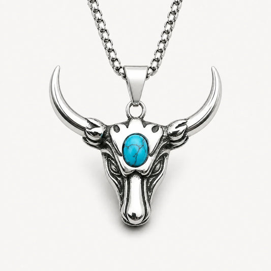 Taurus Guardian Necklace with turquoise accent on a warm white studio background