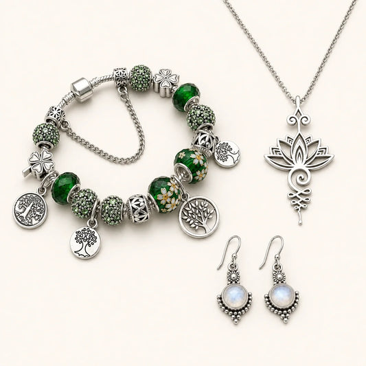The Harvest Trio bracelet, lotus necklace, and moonstone earrings on a warm white studio background