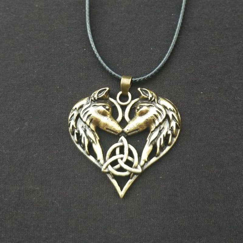 CELTIC TRINITY KNOT HEART SHAPED WOLVES NECKLACE